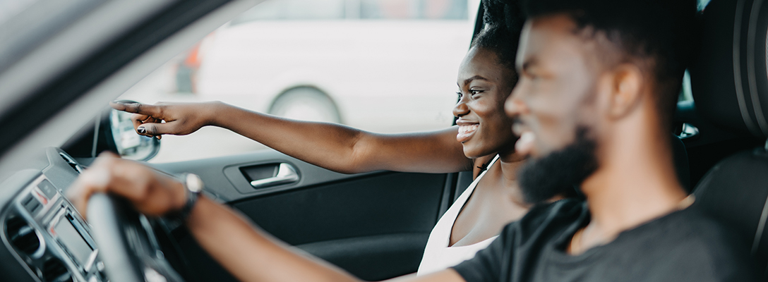 Couple Driving in Las Vegas with Rental Car