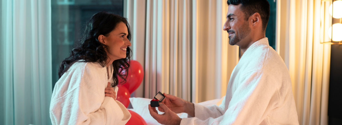 Couple Having Las Vegas Proposal in Hotel Suite