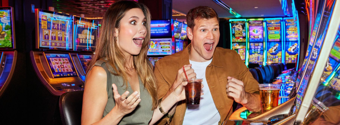 Couple Playing Slots at the D Las Vegas Casino