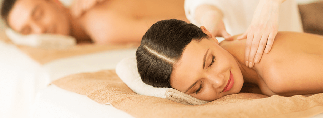 Couple enjoying a spa treatment together