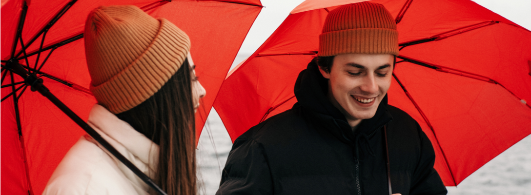 Couple with Umbrellas for Las Vegas Rainy Season