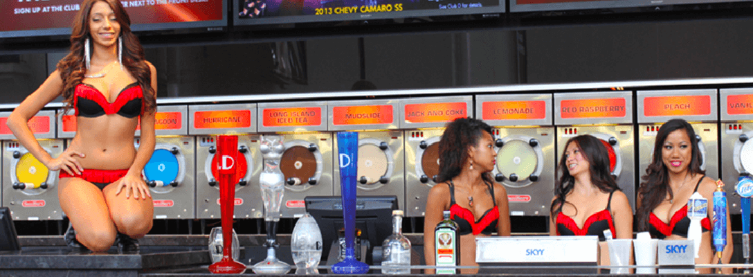 Flair bartenders serving frozen cocktails at the D Bar Las Vegas