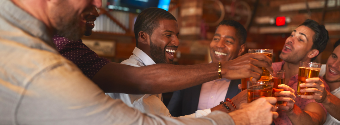 Friends Toasting During Guys Trip to Vegas