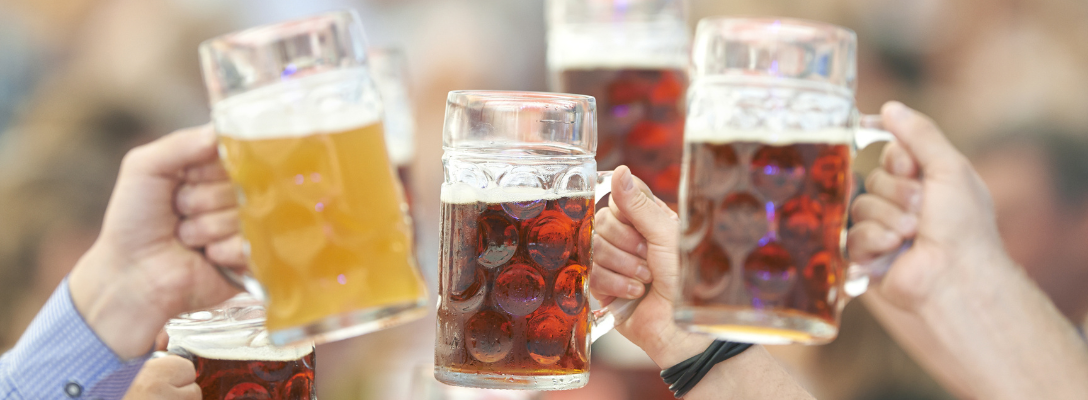 Group Holding Steins at Oktoberfest Las Vegas Beer Festival