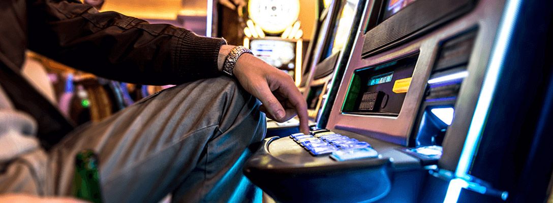 Man Trying for Buffalo Slot Machine Jackpot