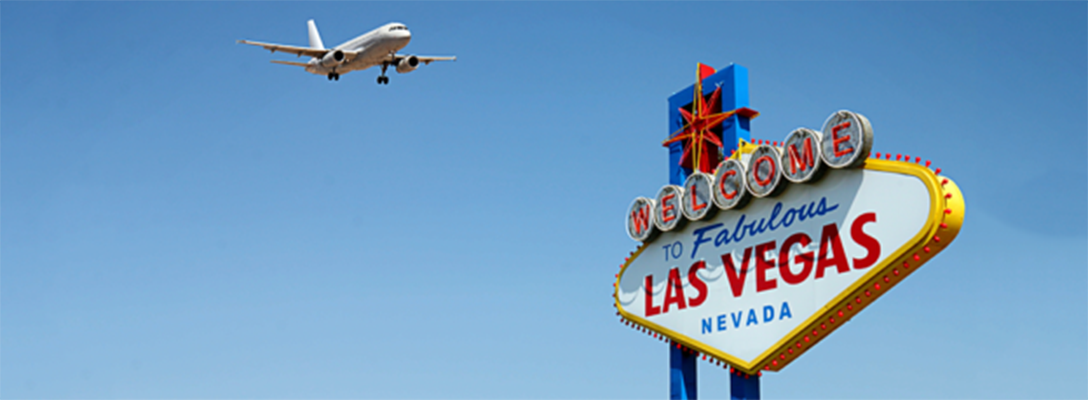 Plane flying into Las Vegas for a summer trip