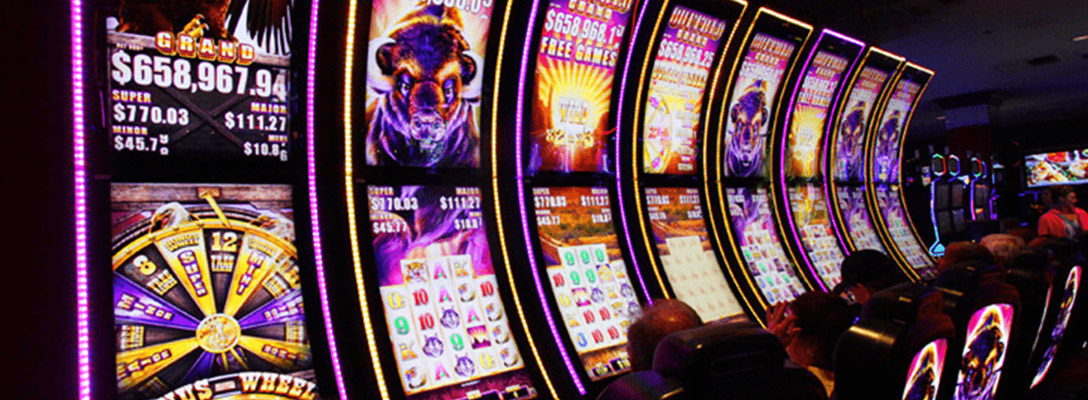 Row of Buffalo Grand Slot Machine Games in Vegas