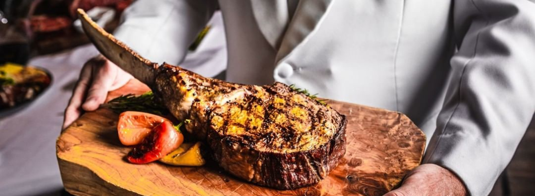 Tomahawk Steak Order from Andiamo Steakhouse in Las Vegas