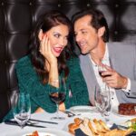 couple eating at a fine dining steakhouse